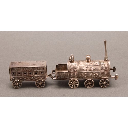 726 - A Chinese silver toy miniature train, comprising railway locomotive and carriage, 10cm long overall,... 