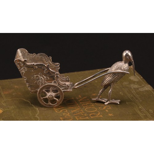 1007 - An early 20th century Continental silver toy novelty miniature model, of a stalk drawing a carriage,... 