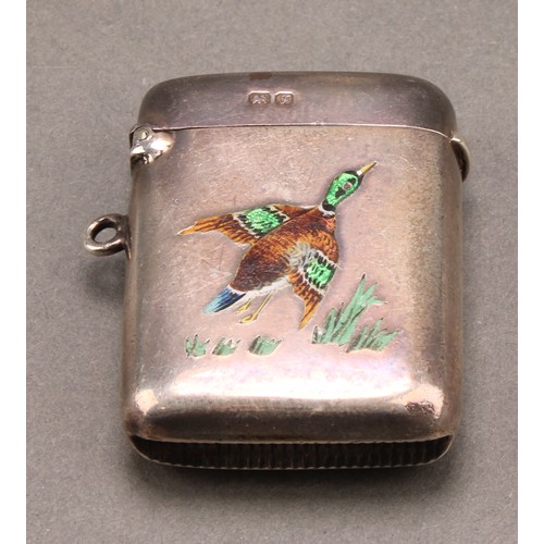 807 - A George V silver and enamel rounded rectangular vesta case, decorated with a mallard duck taking fl... 