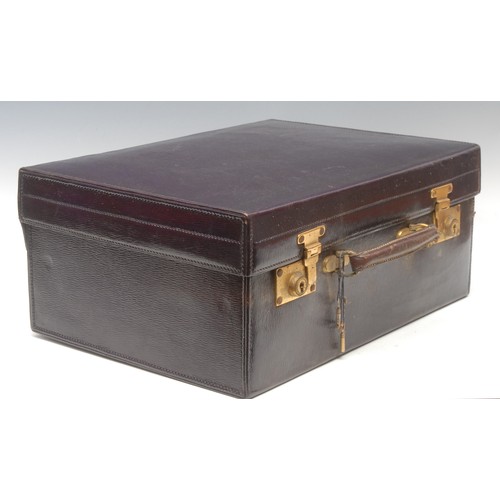 2201 - A George V silver fitted purple morocco leather travelling case, hinged cover enclosing bottles, jar... 