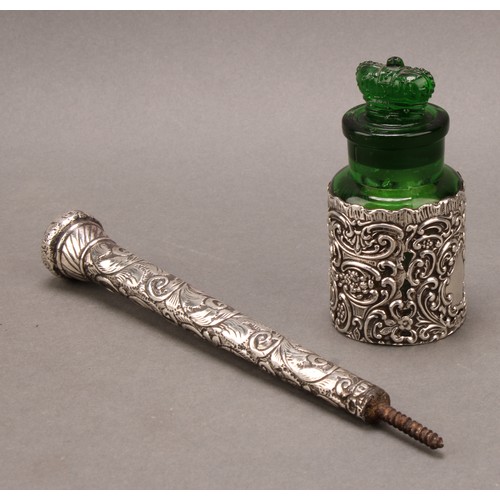 846 - A late Victorian silver clad green glass scent or salts bottle, crown stopper, the sleeve 10.5cm hig... 