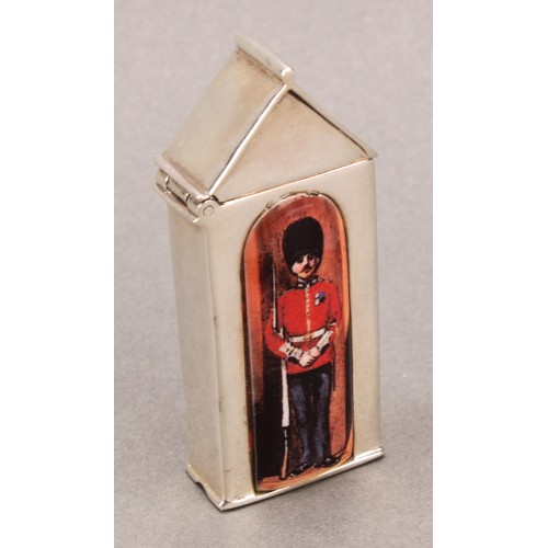 915 - A silver and enamel novelty vesta case, decorated with a guardsman in a sentry box, 6cm long, marked... 