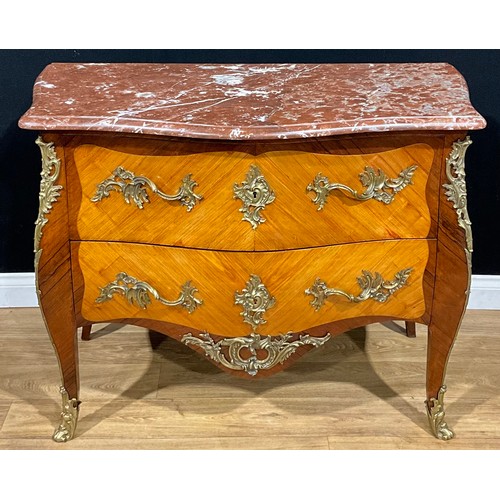 2409 - A Louis XV Revival gilt metal mounted satinwood and kingwood serpentine commode, marble top above tw... 