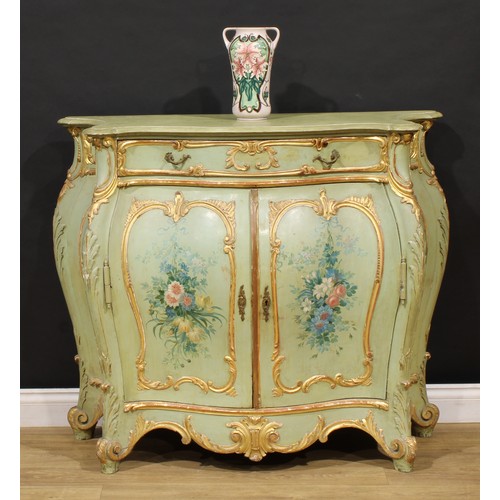 1521 - An Italian painted and parcel-gilt serpentine side cabinet, possibly Venetian, oversailing top above... 