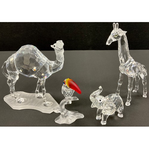 78 - Swarovski Crystal model animals including; Giraffe, 13cm high, Camel on frosted plinth, 12cm long, T... 