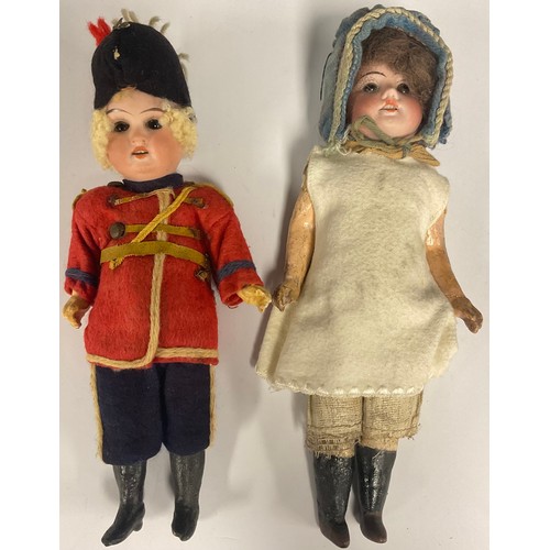 6413 - An Armand Marseille 1894 bisque head soldier boy doll, fixed eyes, open mouth, blond curly hair, wea... 