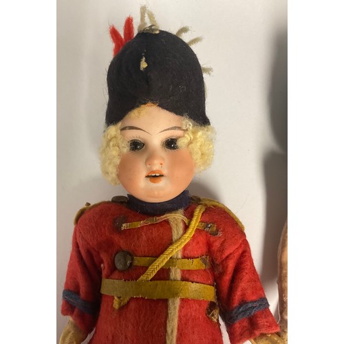 6413 - An Armand Marseille 1894 bisque head soldier boy doll, fixed eyes, open mouth, blond curly hair, wea... 