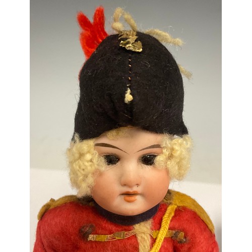 6413 - An Armand Marseille 1894 bisque head soldier boy doll, fixed eyes, open mouth, blond curly hair, wea... 