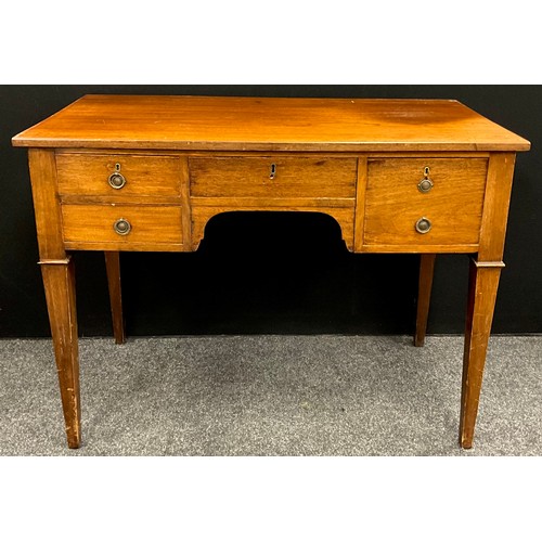 603A - A 19th century mahogany writing table, four drawers to frieze, arch-top knee-hole, tapered square le... 