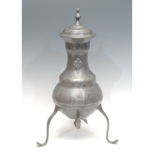 604A - A Dutch pewter kraantjeskan or samovar, of ovoid form, applied fleur-de-lis, swan neck spigot, suppo... 