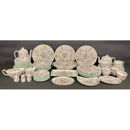 113 - A Minton Haddon Hall pattern dinner and tea service for eight, comprising dinner plates, dessert pla... 