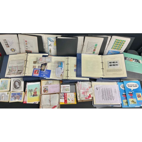 359 - Stamps - two boxes of QEII material, FDC and mint stamps in eight black binders and three Millennium... 