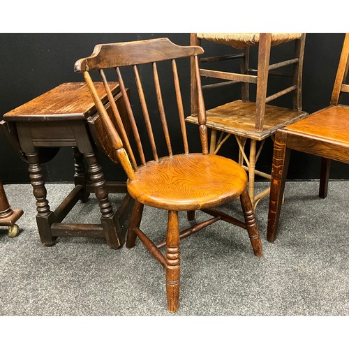 28 - A 19th century elm and beech child's chair; a rush-seated child's chair; oak drop-leaf side table, e... 