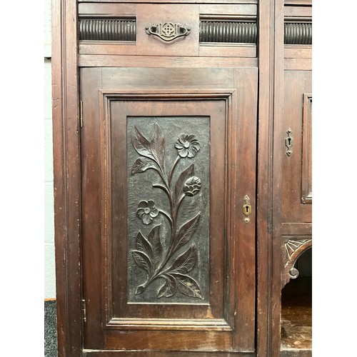 38 - A Victorian mahogany cabinet, the top with three glazed doors, and glazed sides, enclosing shelving,... 