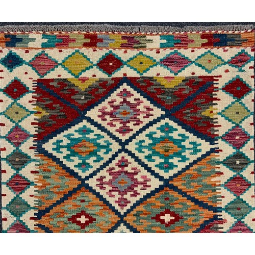 53 - A Turkish Anatolian Kilim runner carpet, 305cm x 80cm.