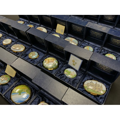 179 - Crummles hand painted enamel pill boxes including; Windsor Castle, The London Oratory, Town Hall Wim... 