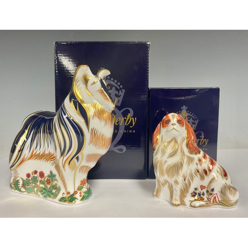 2 - A Royal Crown Derby Paperweight Rough Collie, gold stopper printed marks, another Cavalier King Char... 