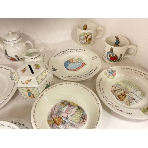 146 - Wedgwood from the Beatrix Potter designs including; children’s bowls, money boxes, circular dishes a... 