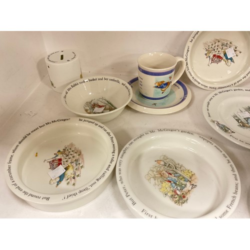 146 - Wedgwood from the Beatrix Potter designs including; children’s bowls, money boxes, circular dishes a... 