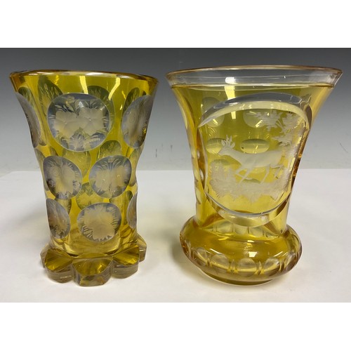 651 - A pair of 19th century Bohemian glass vases, engraved with floral panels and deer in landscape, 13.2... 