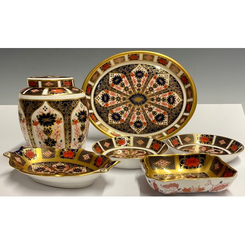 33 - Royal Crown Derby - an 1128 Imari ginger jar and cover, oval tray, pair of circular trinket dishes e... 