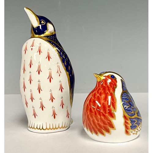 36 - A Royal Crown Derby paperweight Robin, gold stopper printed marks;  another Penguin, no stopper, pri... 