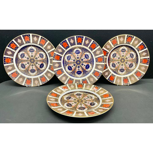 46 - Royal Crown Derby - a set of four 1128 Imari dinner plates, 27cm diameter, all firsts, printed marks... 