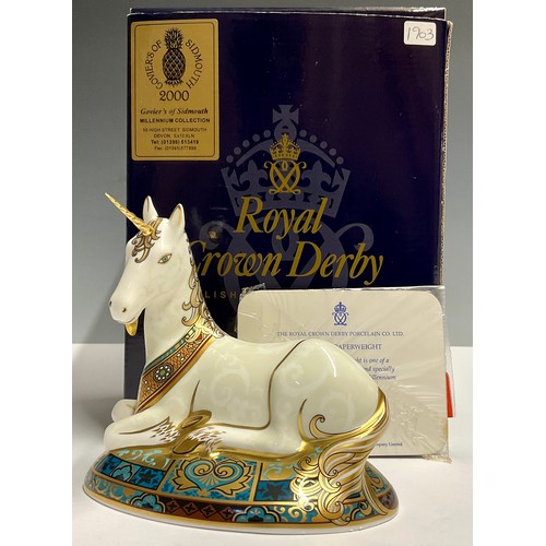 27 - A Royal Crown Derby paperweight, Unicorn, specially designed to celebrate the New Millennium, limite... 