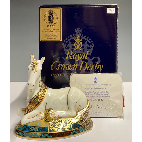 27 - A Royal Crown Derby paperweight, Unicorn, specially designed to celebrate the New Millennium, limite... 