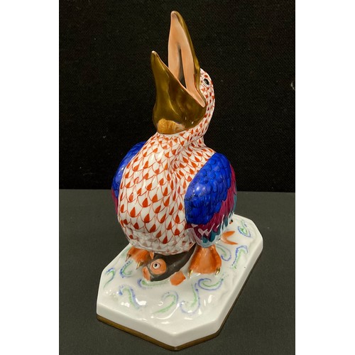 1 - A Herend hand painted porcelain model of a Pelican, standing with open beak on rectangular base with... 