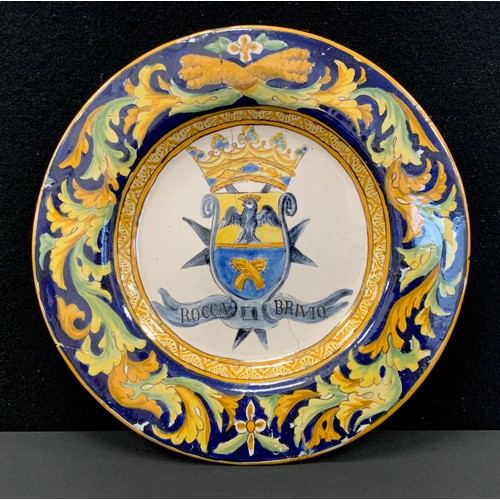 3 - A 19th century Italian maiolica plate, decorated with armorial, titled ‘Rocca Brivio’, 27cm diameter... 