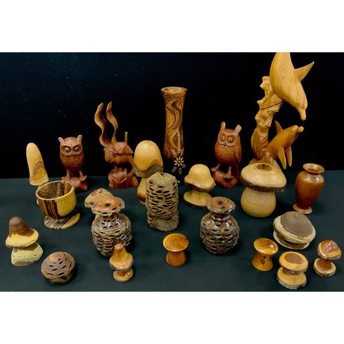 33 - Treen - a group of Australian Banksia nut vases, 13cm high and smaller;  turned yew wood toadstools;... 