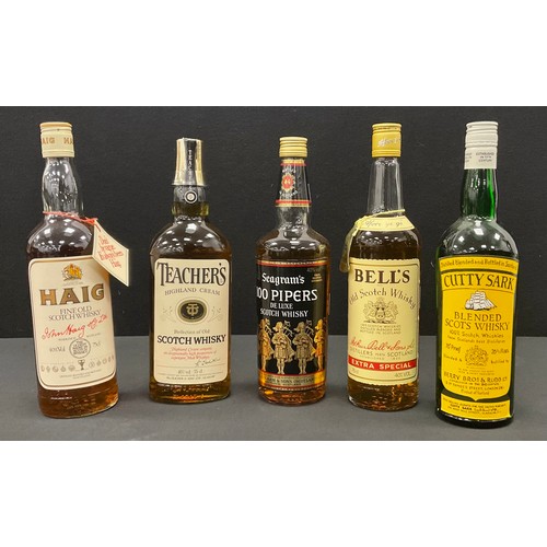 26 - Spirits and whiskeys including; Haig fine old scotch whiskey 40% vol 75cl, Cutty sark blended Scot’s... 