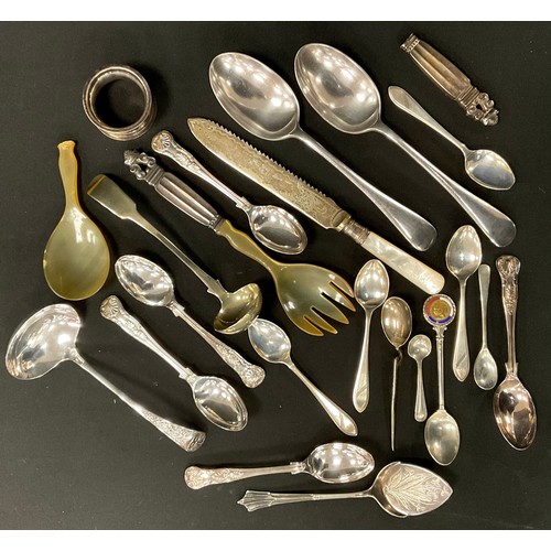 219 - A set of four silver tea spoons, Sheffield, 1945, 54.82grams; other flatware