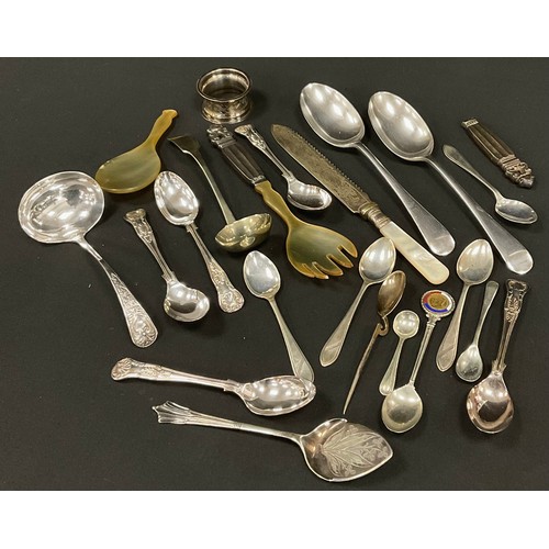 219 - A set of four silver tea spoons, Sheffield, 1945, 54.82grams; other flatware