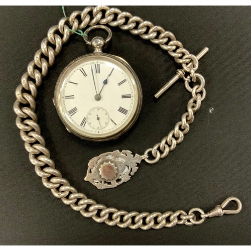 239 - A Victorian silver pocket watch, white enamel dial, bold Roman numerals, subsidiary seconds, key win... 