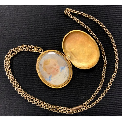 240 - An unmarked yellow metal oval locket pendant, the suspension ring stamped 18ct, 6g, suspended from a... 