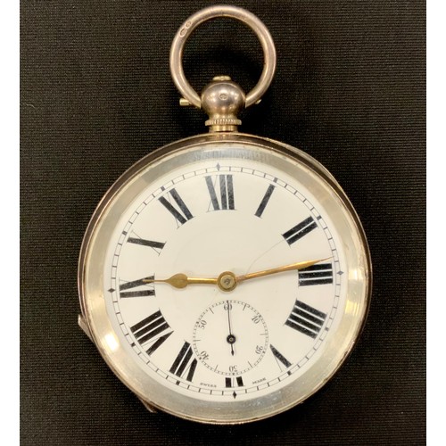 249 - A silver pocket watch, white enamel dial, bold Roman numerals, subsidiary seconds, key wind movement... 