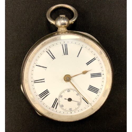 254 - A Victorian silver pocket watch, white enamel dial, bold Roman numerals, subsidiary seconds, key win... 