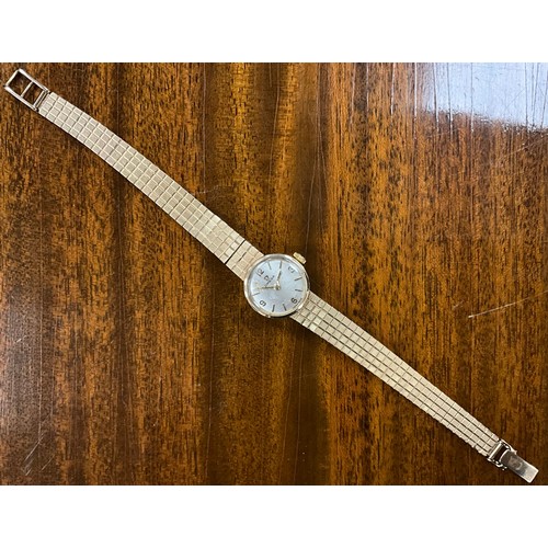 1037 - Omega - a 1960s 9ct gold lady's cocktail wristwatch, silver dial, quartered Arabic numerals and bloc... 