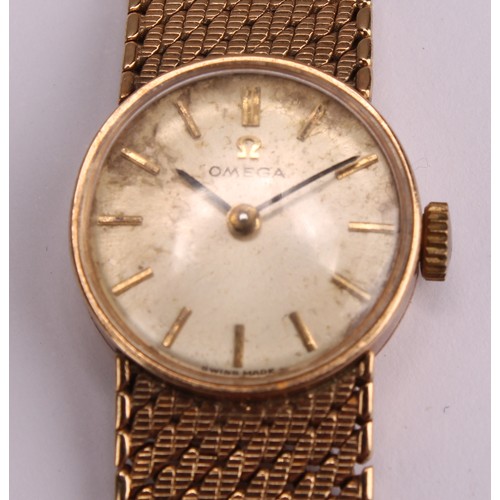 1048 - Omega - a lady's 9ct gold cased wristwatch, silver dial, block baton markers, manual wind 484 cal 17... 