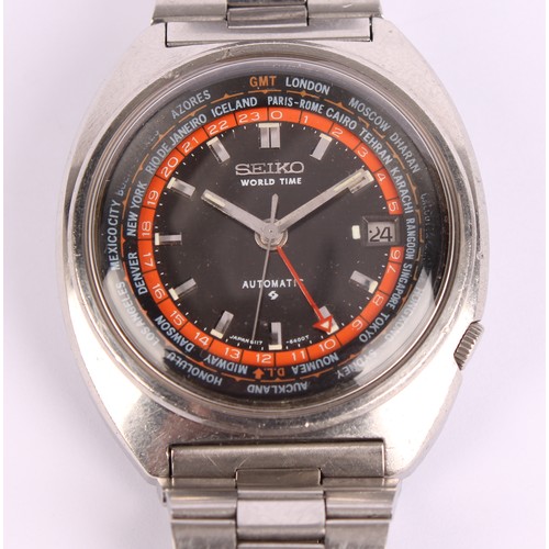 1056 - Seiko - a World Time stainless steel automatic wristwatch ref 6117-6400,  graphite dials, red outer ... 