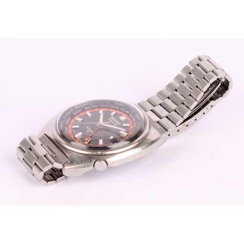 1056 - Seiko - a World Time stainless steel automatic wristwatch ref 6117-6400,  graphite dials, red outer ... 