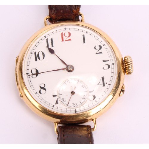 1094 - Longines - an 18ct gold trench wristwatch, 30mm diameter case, white enamel dial, black Arabic numer... 