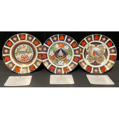 5 - A matched set of three Royal Crown Derby Christmas plates, comprising, The First Royal Crown Derby C... 