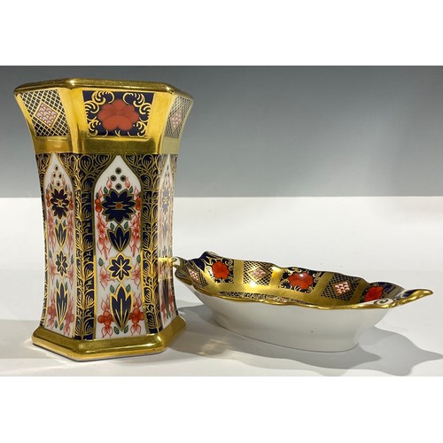 16 - A Royal Crown Derby 1128 Imari pattern hexagonal vase, gold band, 11.5cm high, first quality; a simi... 