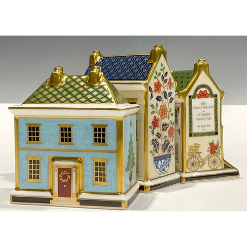 24 - A Royal Crown Derby miniature model, The Florist, ‘Love Blossoms’, a limited edition of 500 exclusiv... 