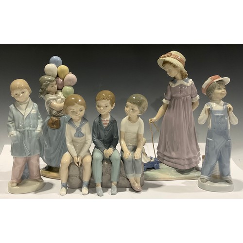 59 - LLadro figures - Three Boys Sitting, No 4980, Girl Pulling a Doll, No 5044, Balloon Seller, No 5141,... 