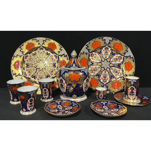 64 - A Hamilton Imari urn and cover; plates; spill vase; etc