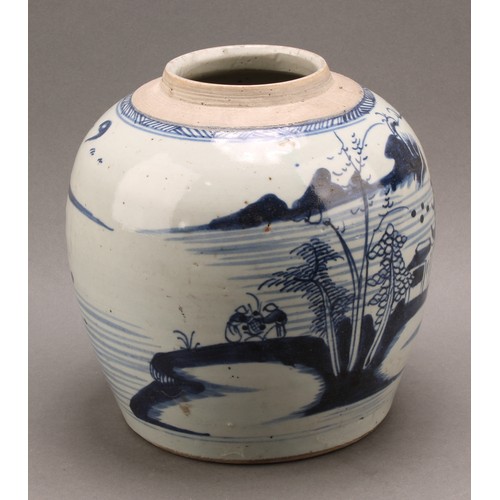 68 - A Chinese ovoid ginger jar, painted in tones of underglaze blue with a landscape, 23cm high, 19th ce... 